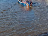 Łódka na kanele, z Blauwbrug w Amsterdamie